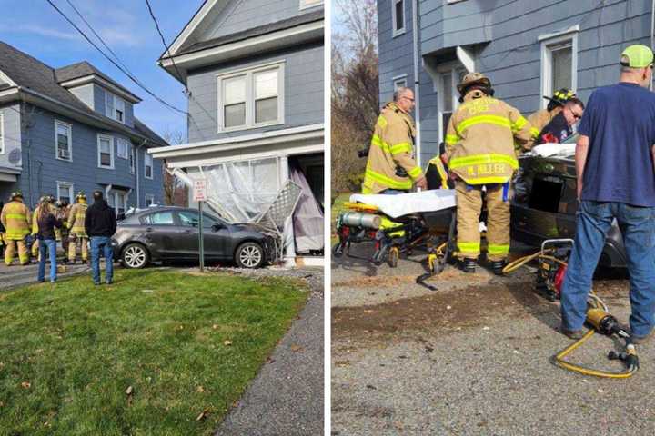 Trapped Driver Rescued After Crashing Car Into House In Brewster