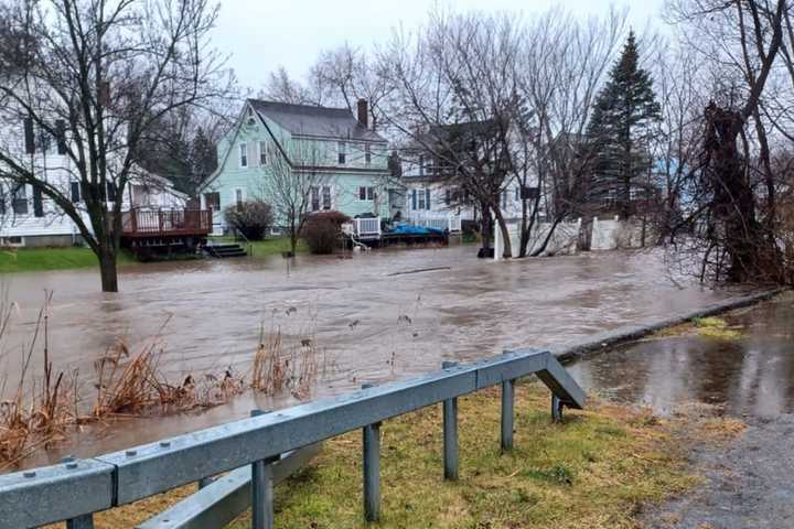 Widespread Flooding, Road Closures Reported As Potent Storm Drenches Region