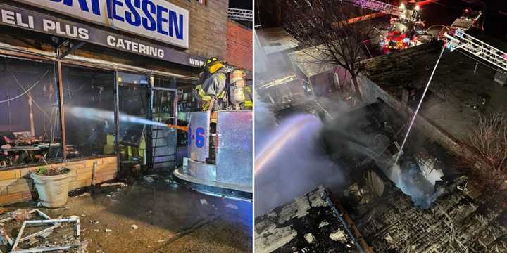 Firefighters respond to a blaze that heavily damaged Franks Deli Plus in West Babylon on Thursday, Dec. 28.&nbsp;