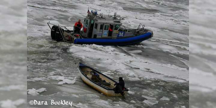 SCPD Marine Bureau officers rescue a 73-year-old Shirley man whose boat got stuck in ice near Smith Point Bridge on Tuesday, Jan. 23.&nbsp;