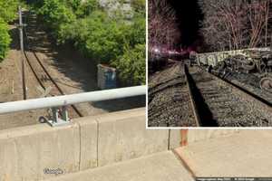 Freight Train Derailment Shuts Down Highway In Region; 2 Cars Plunge Into River