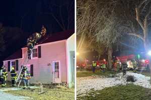 Flames Shoot Out Of Chimney At Bedford Home