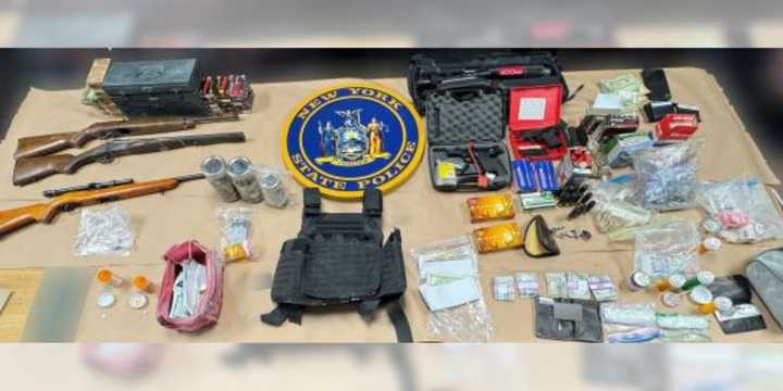 Drugs and weapons that were allegedly seized from a Greenport home on Thursday, March 28.&nbsp;