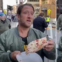 <p>Dave Portnoy tries Pizzeria Sapienza in Albany on Monday, April 8.</p>