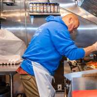 <p>Owner Darin Palmetto in action at&nbsp;Spa Café on Broadway in Saratoga Springs.</p>