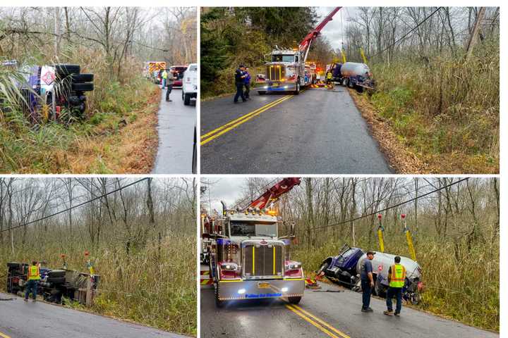 Propane Truck Rolls Over Into Embankment In Area