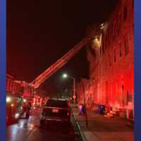 Multiple Rowhomes Go Up In Flames Overnight In Baltimore