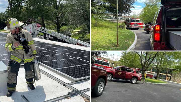 Firefighters respond to a blaze on the roof of the Pocantico Hills School, which was sparked by a burnt-out solar panel.