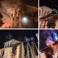 <p>Firefighters battle a house fire in Port Chester on Soundview Street.</p>