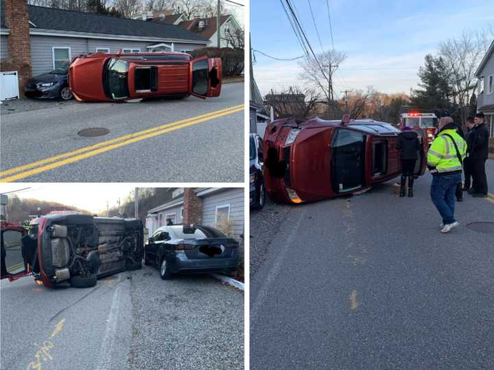 A car flipped on its side in Mahopac on Clark Place.