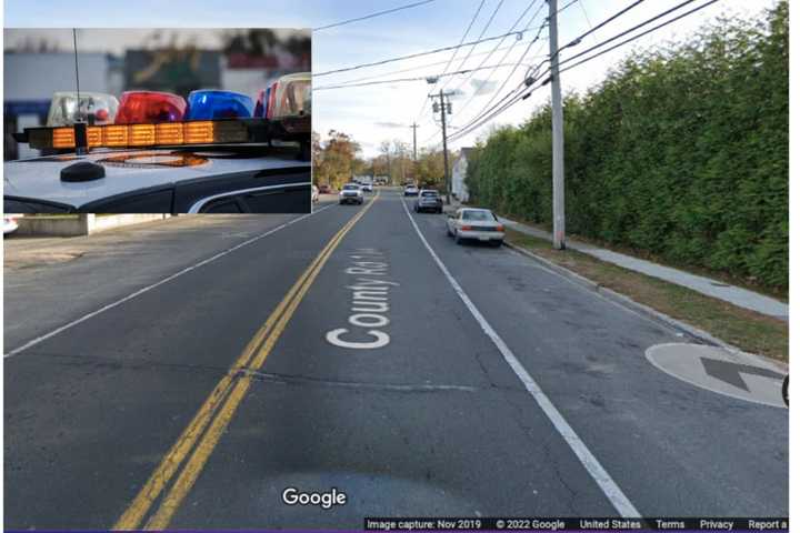 A Mack truck hit a BMW and then a residence on Long Island.