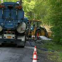 Water Main Break Leaves Large Hole In Yorktown's Greenwood Street