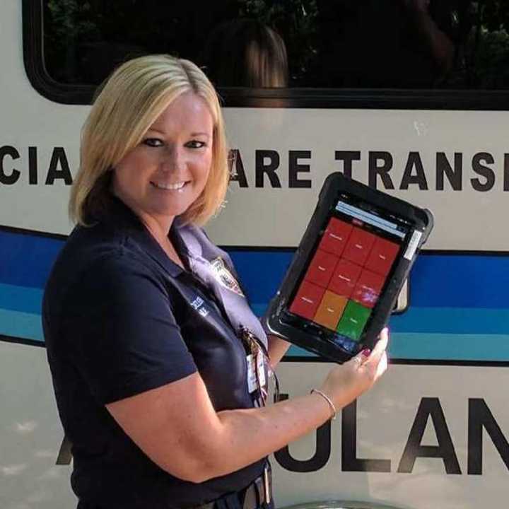 Tamara Baldesweiler, R.N., a member of Valley&#x27;s Specialty Care Transport Unit, uses the Twiage app.