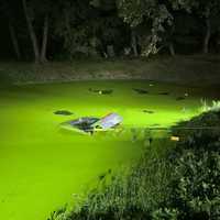 Hudson Valley Woman Rescued By Police After Driving Into Pond, Issued 50 Tickets, Cops Say