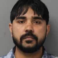 'Coordinated Scam': Police Intercept Monetary Exchange Targeting North Amityville Woman