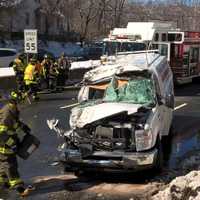 <p>The 2-ton Bobcat landed on the cab of the van on Route 208 in Hawthorne.</p>