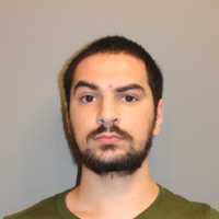 Man, 22, 'Interested In Committing Mass Shooting' Nabbed In Norwalk With Weapons Cache
