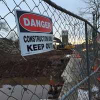 <p>A sign warns bystanders to keep out while site preparation proceeds in Teaneck.</p>