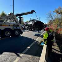 <p>The truck is being pulled from the river.&nbsp;</p>