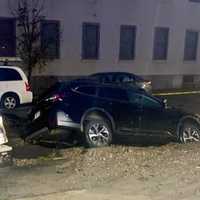 Sinkhole Swallows Subaru SUV After Water Main Bursts In Boston: Report