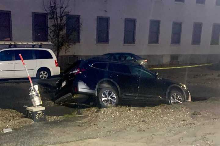 Sinkhole Swallows Subaru SUV After Water Main Bursts In South End: Report