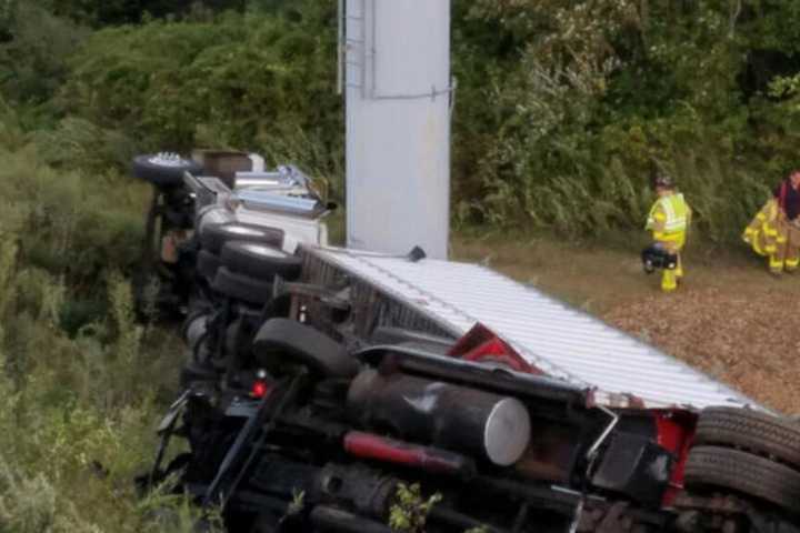 Two Tractor-Trailers Go Down Embankment Off I-95
