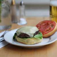 <p>A burger from Whitmans at the new Savor in White Plains.</p>