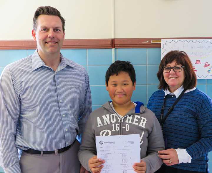 Ryan Raymundo with his fifth grade teacher, Erik Olson, and Franklin School Reading Specialist Joanne Mickolajczyk