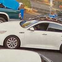 <p>The 2016-20 Kia Optima with a bullet hole in the rear driver side door.</p>