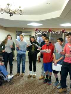 Yorktown High School Students Bring Holiday Music To Field Home