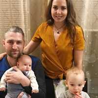 <p>Nikolas, his parents and baby brother, Mattie.</p>