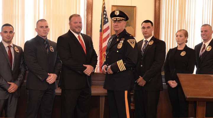 (Left to right): Mark Rivera, Brian Kapp, Commissoner John Montillo, Jr., Police Chief James O’Connor, Anthony Calabro, Elizabeth Hollenbeck, Matthew Dudek