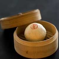 <p>Steamed white fluffy bao stuffed with a generous portion of house made cha siu pork filling.</p>