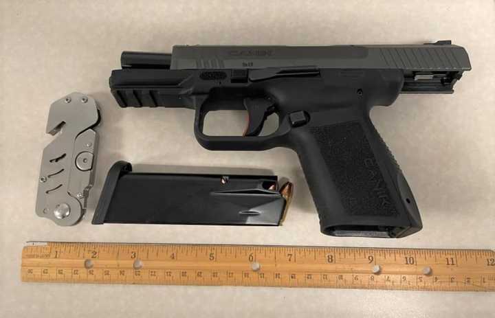 The 9mm gun was not loaded, but it was accompanied by a gun magazine containing 15 bullets,  the Transportation Security Administration said.