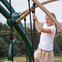 <p>Emma Hayes-Setterlund of Wilton enjoys the outdoors at Ridgefield Academy, which returned to class last week.</p>