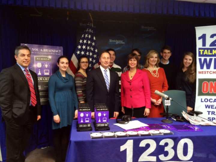 Lisa Wexler, center in red, with a host of Acorda winners.