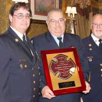 <p>Al Luna is honored.</p>