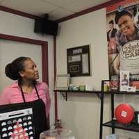 <p>The shop at Angela Logan's Mortgage Apple Cake is decorated in -- what else? -- apple colors.</p>