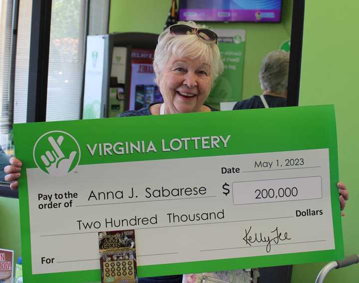 Anna Sabarese scored $200,000 when she won a Livin&#x27; Lucky With Luke Combs VA Lottery ticket.