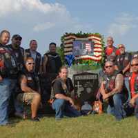 <p>Members of the North Jersey Chapter at &quot;Axe&quot; &#x27;s grave</p>