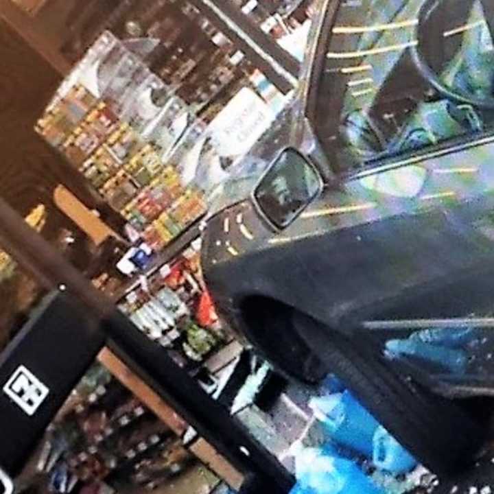 The Toyota jumped the curb and slammed through the two front windows of the Grand Avenue store around 1:30 p.m., Police Capt. Tim Torell said.