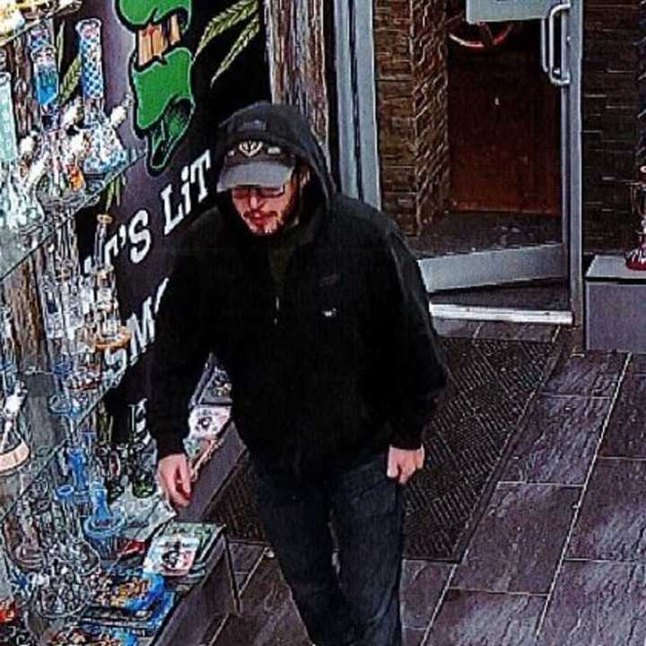 Police are asking for the public’s help finding a man accused of using stolen credit cards at two stores in Huntington.