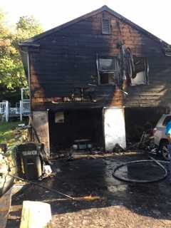 Lawnmower Fire Extends To Norwalk Home, Causing Extensive Damage