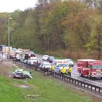 <p>The car came to rest in a grassy ditch between the Exit 168 ramp and the northbound Parkway.</p>