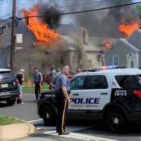 <p>Neighbors reported hearing and feeling explosions in the Saddle Brook fire.</p>