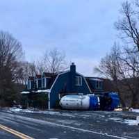 Monroe Truck Driver Cited After Propane Tanker Goes Off Road And Hits House