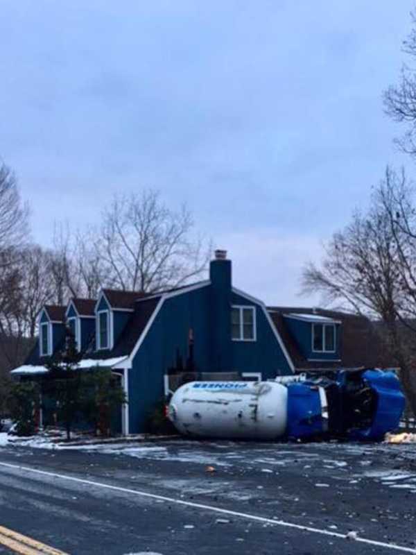 Monroe Truck Driver Cited After Propane Tanker Goes Off Road And Hits House