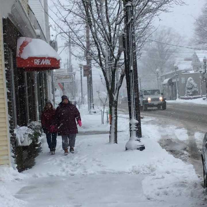 Friday morning&#x27;s heavy snow isn&#x27;t stopping these two women from taking a walk all along Greenwood Avenue in downtown Bethel.