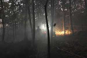 Firefighters Battle Large Brush Fire In Bethel