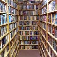 <p>Paperbacks of every stripe line the shelves at The Bookworm in Poughkeepsie. The store, which has been a haven for book lovers for 25 plus years, is closing in June.</p>